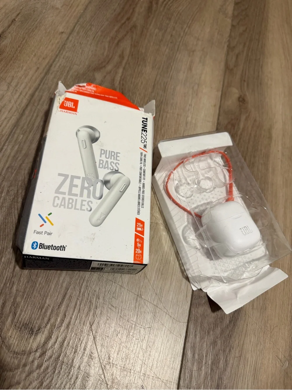 JBL White Wireless Earbuds with Orange Accent Charging Cable